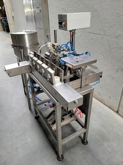 Semi-automatic tube filler