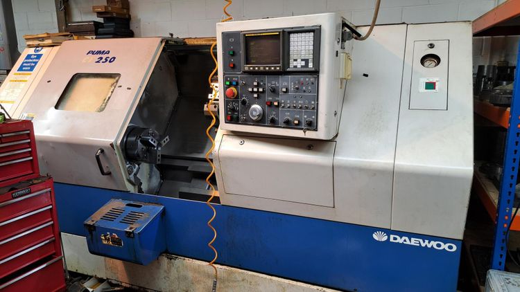 Daewoo FANUC 21-T 3500 RPM Puma CT 250 CNC Lathe 3 Axis