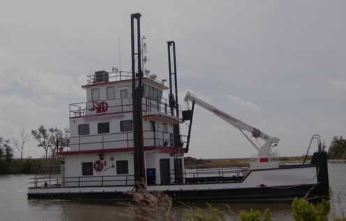 Inland Self Propelled work barge with spuds and crane