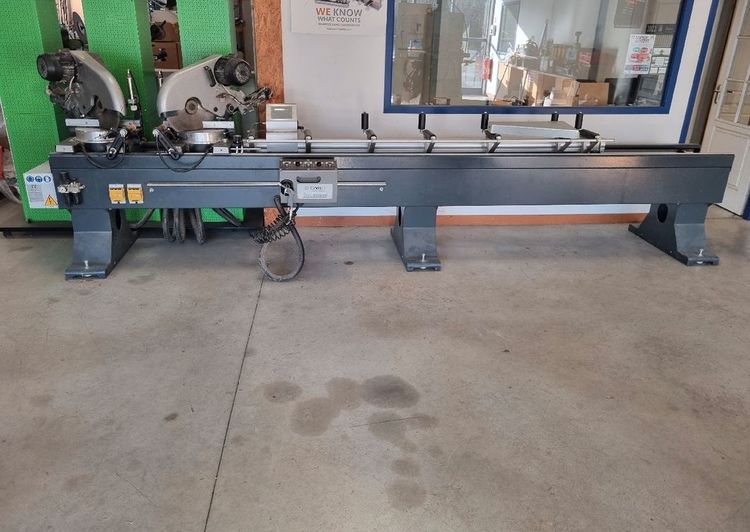 Comall Mach 400VE double head saw Semi Automatic