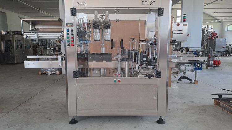 OMB THREE-STATION ADHESIVE LABELLING MACHINE
