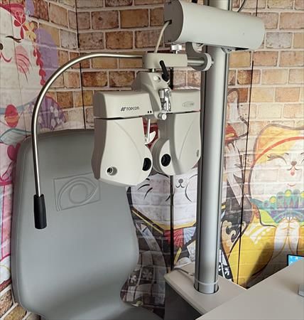 Nidek OT-1400 gray and white refraction unit