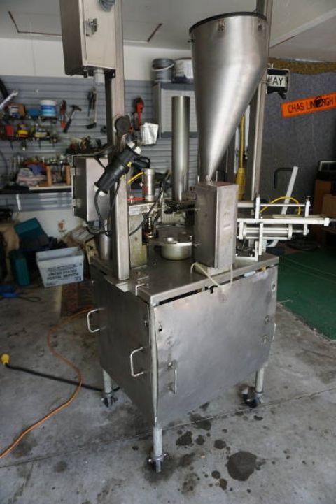 World Cup 8-12  ROTARY CUP FILLING/SEALING MACHINE
