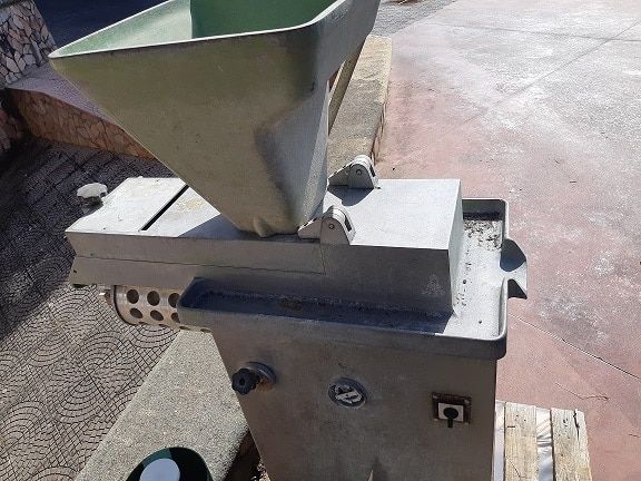 Old double auger moulder