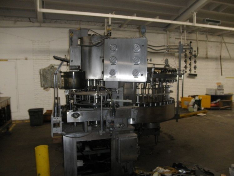 Crown ,52 Head Bottle Filler with Alcoa 13 head rotary capper