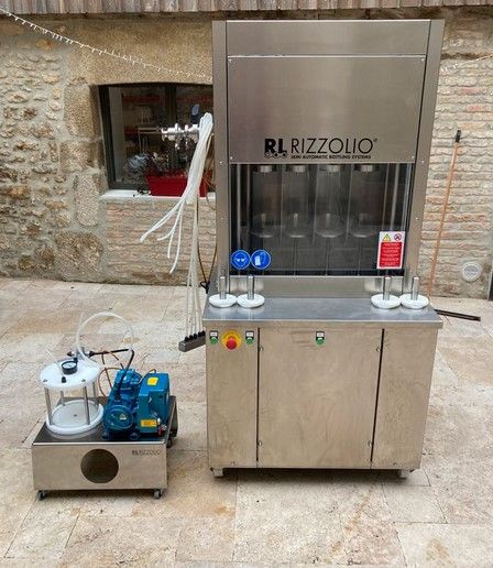 Rizzolio 4 semi-automatic isobaricBottler