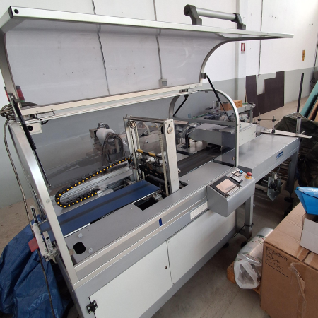 Horizontal packaging machine with bottom reel