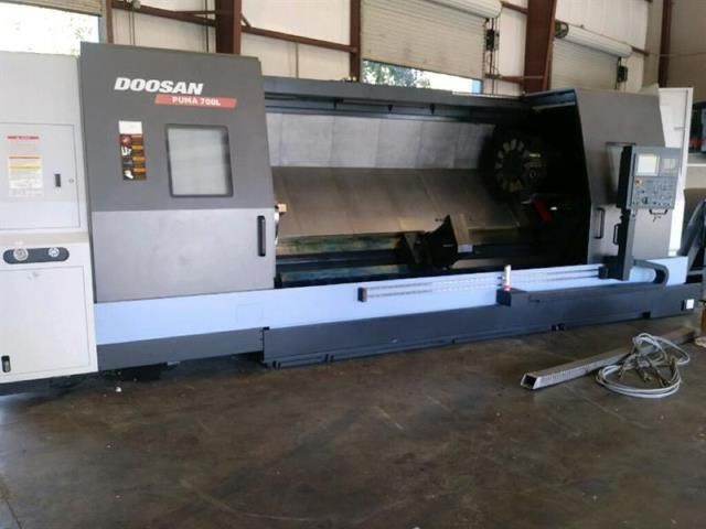 Doosan FANUC 32I CONTROL WITH MANUAL GUIDE I 1500 RPM PUMA 700L 2 Axis