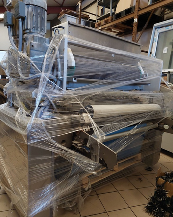 Padovani Depositor on conveyor