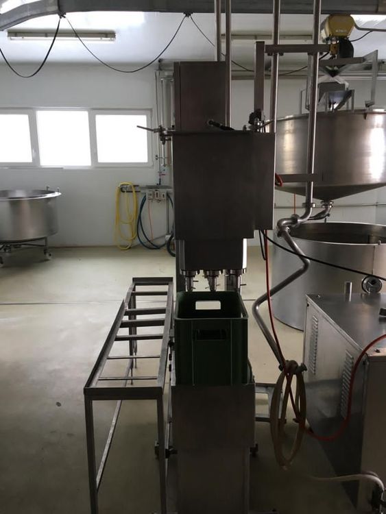 SEMI AUTOMATIC MILK FILLING MACHINE