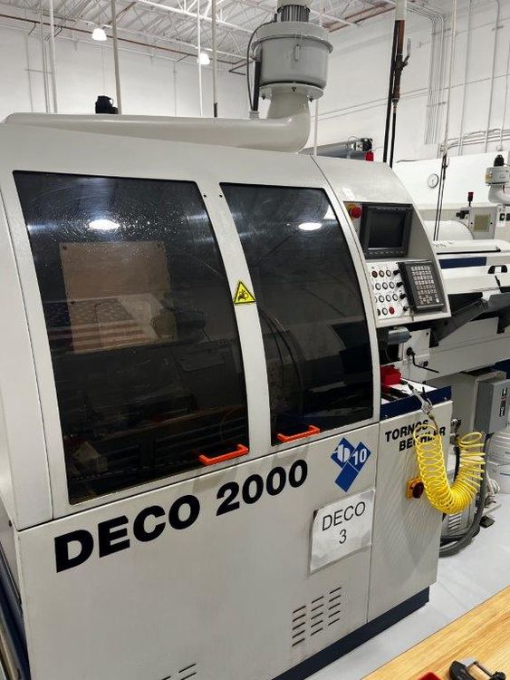 Tornos TORNOS DECO 10 CNC SWISS TYPE AUTOMATIC SCREW MACHINE NEW: 2001 DECO 10