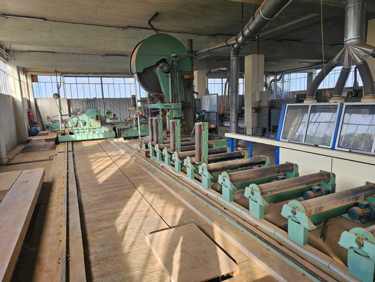 Band saw, drills, sanding, edge banding, lathe, overhead crane, saw blade straightener
