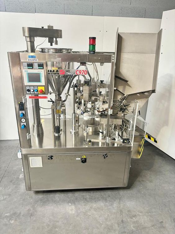 Comadis C970 Tube filling machine