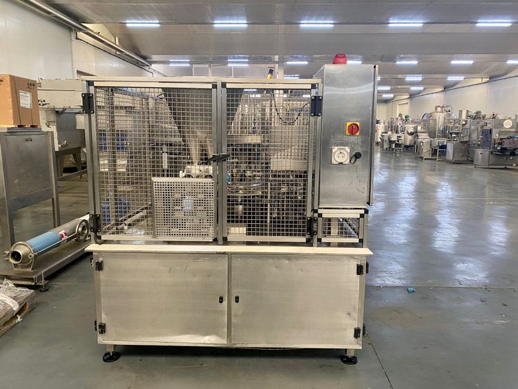 CWM, Automation/Regal RP12 Rotary pot filling and sealing machine