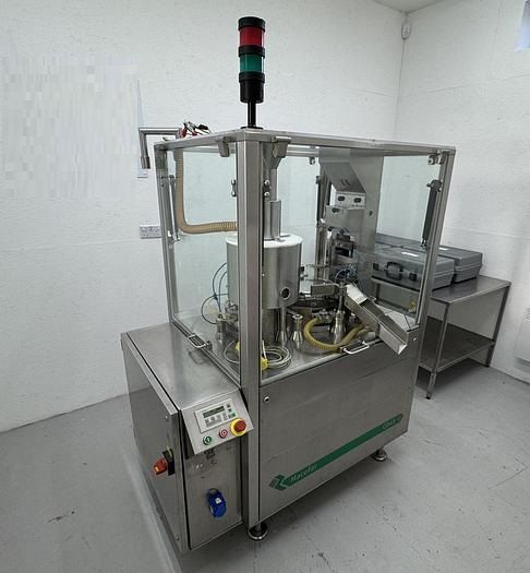 Macofar CD-40, Automatic Capsule Filler