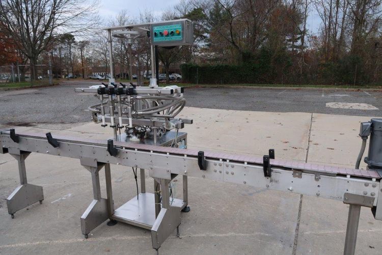 Inline Filling Systems (IFS) 4 Spout Overflow Straight Line Liquid Filler