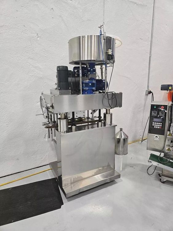 ABCD Pack Ltd XGC-100  Automatic Inline Quill Capper.