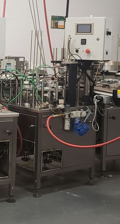 9 Cup Rotary Filling Sealing Machine