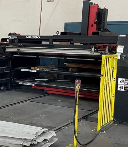 Amada MP1530, 5' x 10' LOAD/UNLOAD press of up to 5' x 10'.