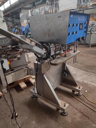 Inline Filling Systems (IFS) Capper with Waterfall feeder