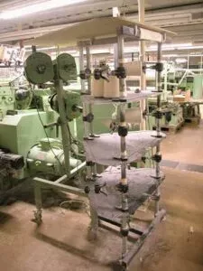 7  Bobbin frame for weft yarn