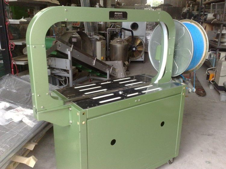 AKROPACK AS-210 FIXED STATION STRAPPING MACHINE
