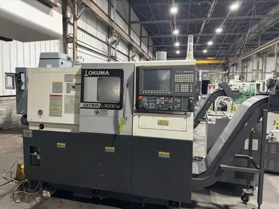 Okuma Okuma OSP-P300LA CNC Control 3,800 RPM GENOS L3000M-E 2 Axis