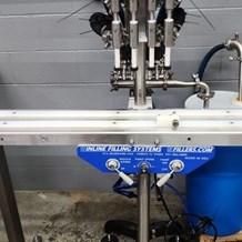 Inline Filling Systems (IFS) Semi Automatic Four Head Overflow Filler
