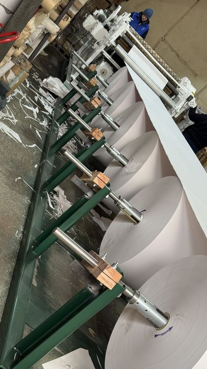 Jagenberg paper roll to sheet cut-sizing machine with 140 cm rotary blades.