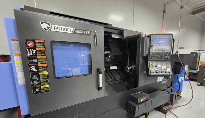 Doosan Fanuc 0i-PLus CNC Control Max RPM	4,000 RPM PUMA 2600SYII 4 Axis