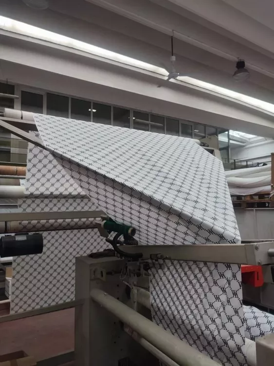 Tecnoteam Fabric folding machine