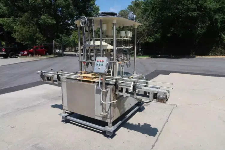 Packaging Dynamics 16 Spout Rotary Pressure Gravity Filling Machine