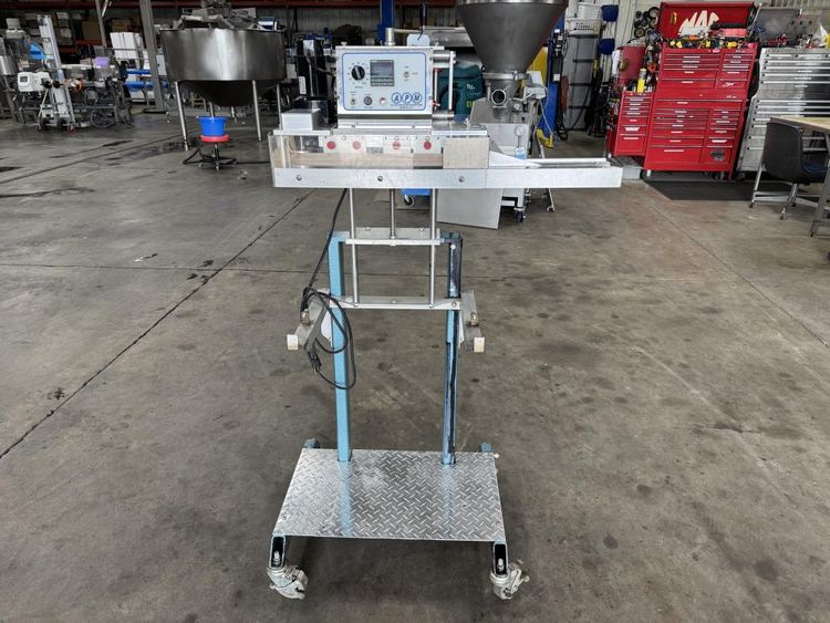 APM VBS-3/8-Lift Vertical Rotary Band Sealing System