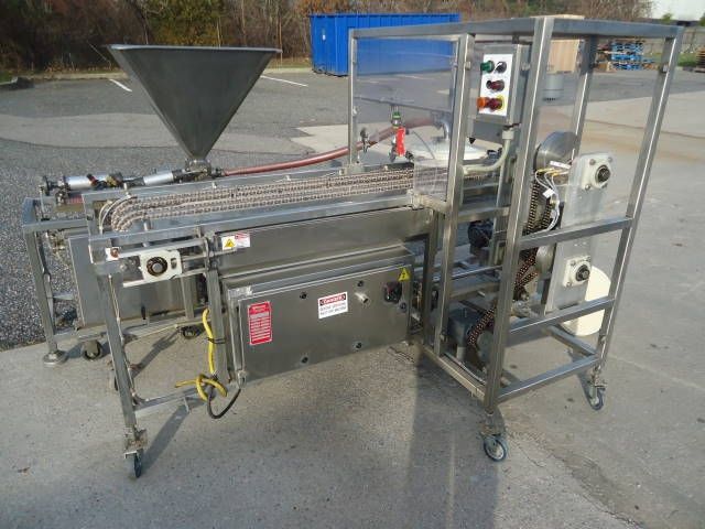 Raque SAUCE DEPOSITING SYSTEM FOR FROZEN PIZZA