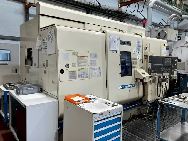 Okuma OKUMA     Model: OSP U100L 5000 rpm 1/MIN MacTurn 250-W 3 Axis