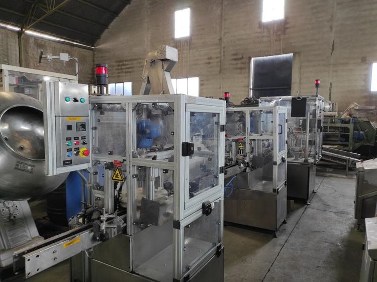 Complete bottling and capping line for hydroalcoholic solution