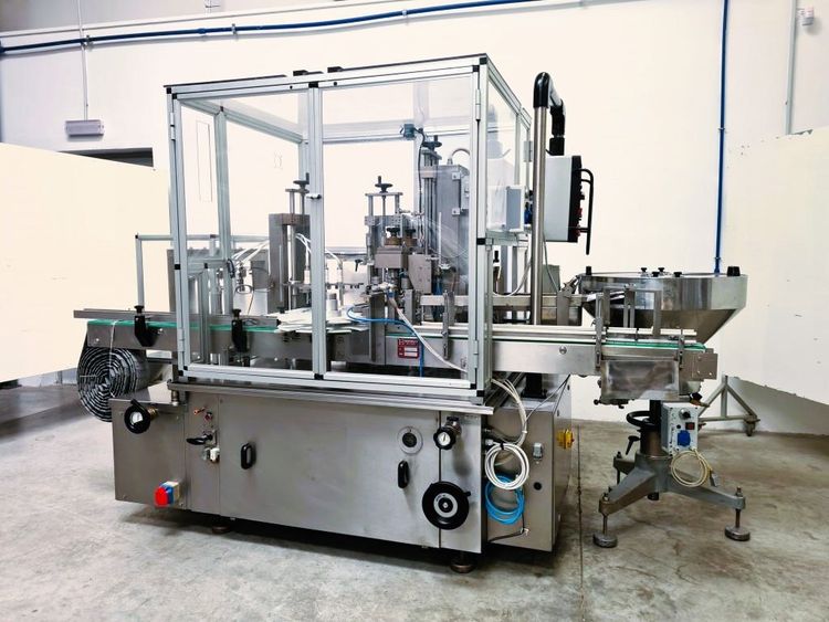 Capsulit BOTTLE FILLING AND CAPPING MACHINE