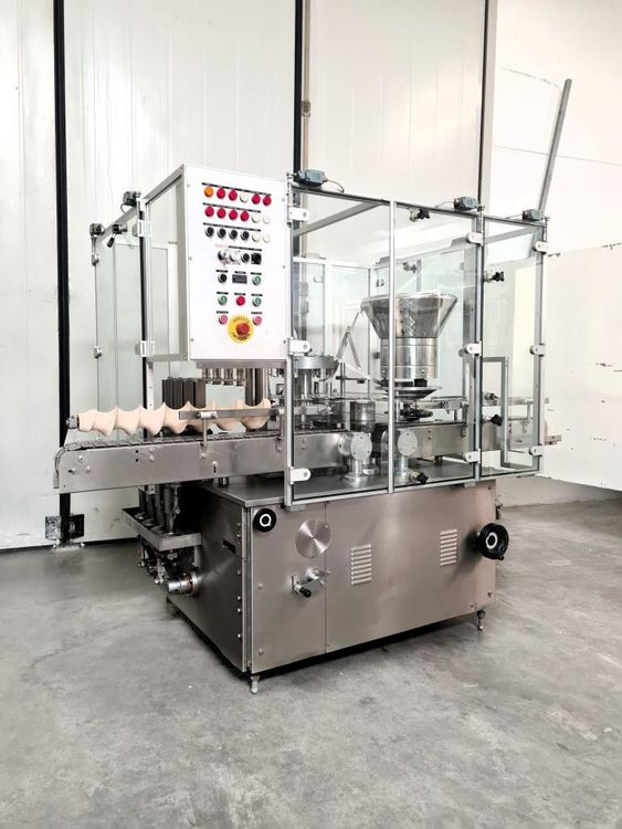 BOTTLE FILLING AND CAPPING MACHINE