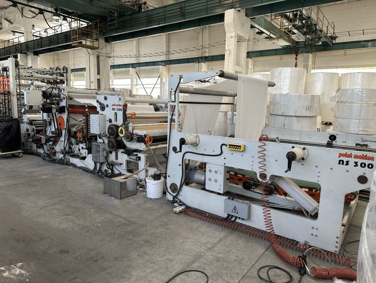 1.350 mm NON STOP rewinder line complete with log saw & wrapper