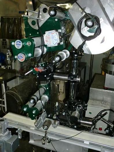 Labeler with Reversible Head
