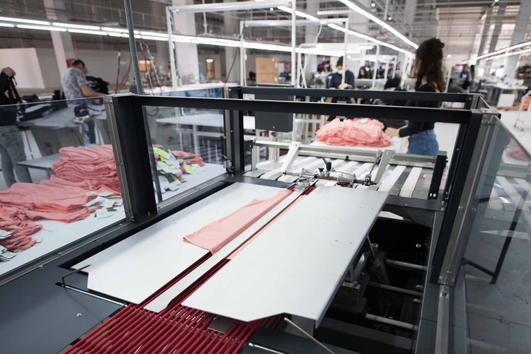 AEM Thermotron Automatic Folding and poly bagging machine