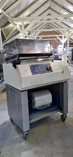 Robopac Micra S shrink wrapping machine