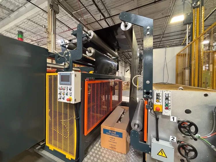 Cantilevered sheet winder