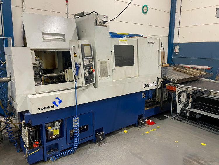 Tornos Fanuc 0i-TD 6000 rpm Swiss Type Delta 38/5 7 Axis