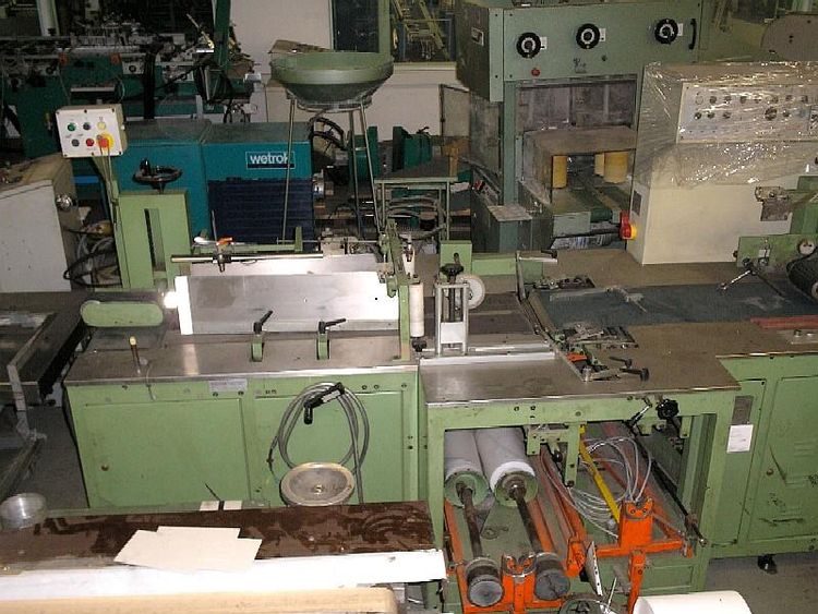 Sitma 705 Inserting machines with film wrapping device