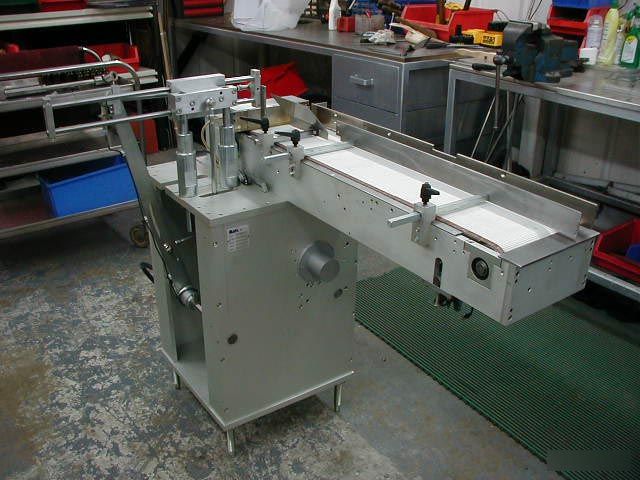 Cam 502H Automatic Container Feeder