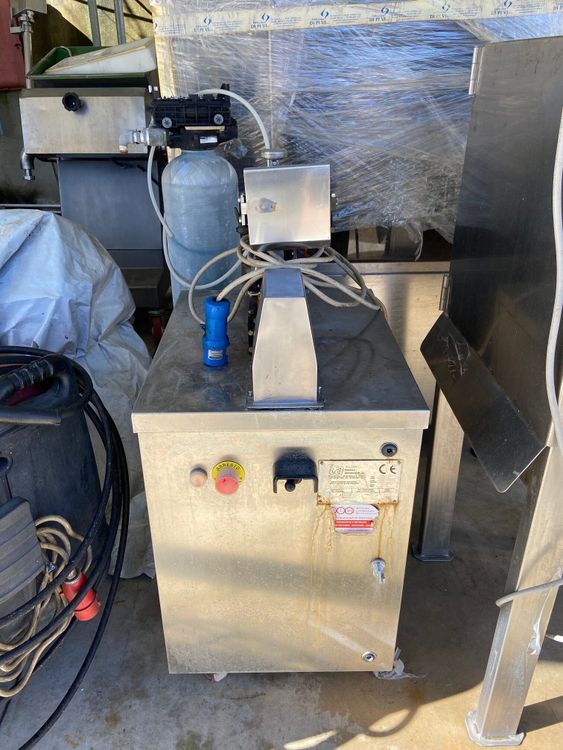 WARM-WELDED SEAL PACKAGING MACHINE