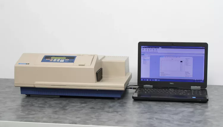 Molecular Devices SpectraMax M5 Multi-Mode Microplate Reader and Laptop