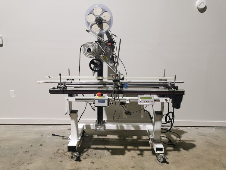 Thomson Clamshell Hugger Conveyor Labeler