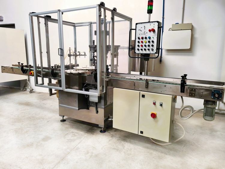 Ima LIQUID FILLING AND CAPPING MACHINE